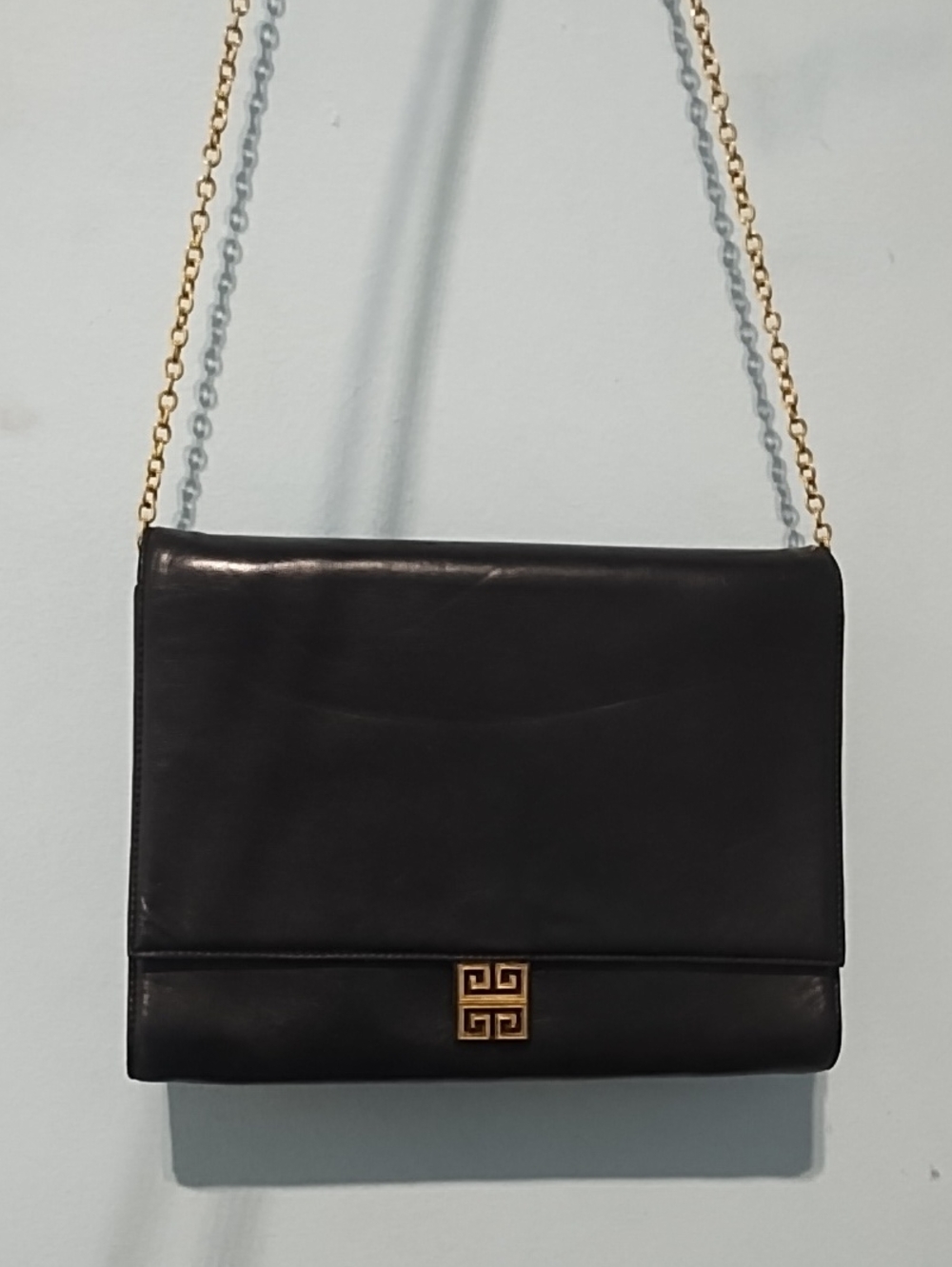 Black Leather Crossbody Bag with Gold Accent